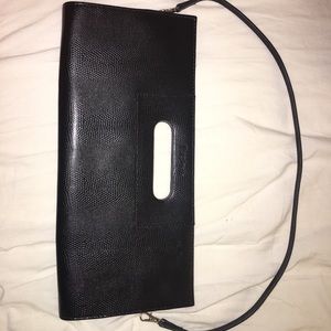 Tuci Ilatia genuine leather wristlet/shoulder bag